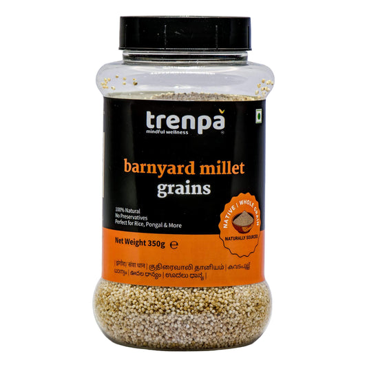 Jar of trenpa barnyard millet grains on a white background