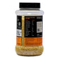 Jar of yellow grains with a black lid on a white background