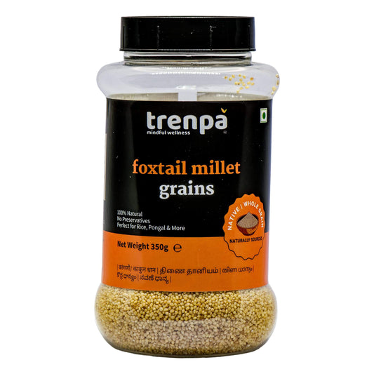 Jar of trenpa foxtail millet grains on a white background