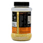 Container of yellow grains with a black label on a white background
